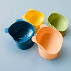 Bát Ăn Chống Gù Hình Gấu Dễ Thương Chân Cao Bằng Nhựa Cho Thú Cưng Chó Mèo